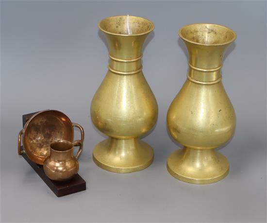 A pair of gilt metal ecclesiastical vases and a miniature jug and dish on stand